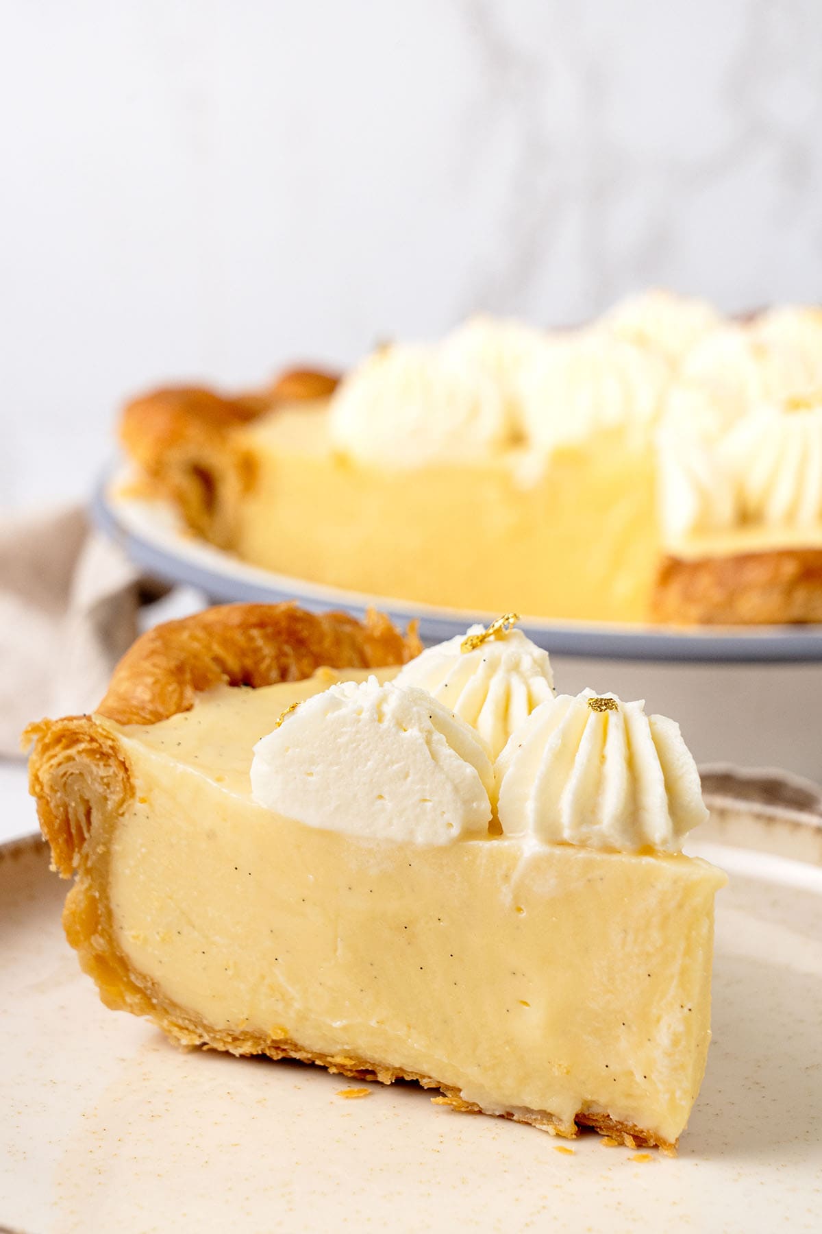 a slice of Vanilla Pie on a plate.