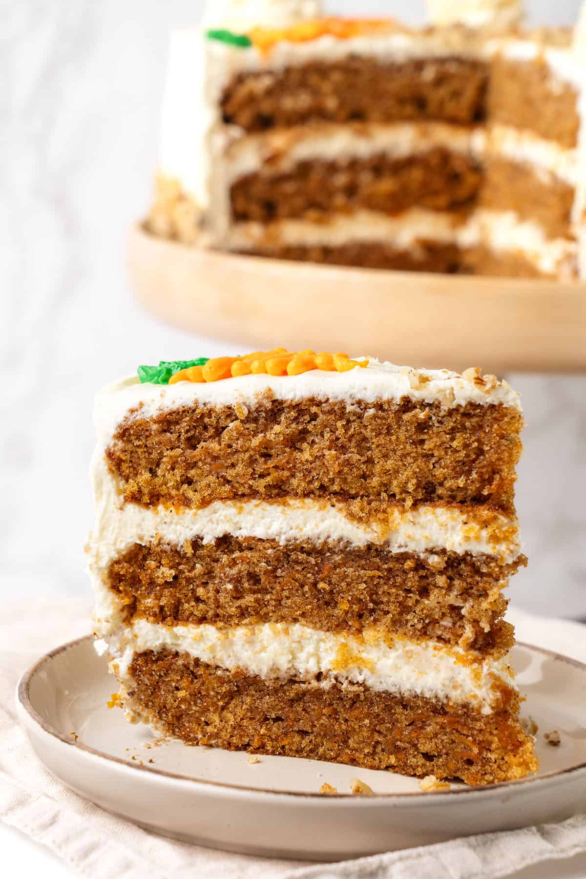 A slice of Carrot Cake on a plate.