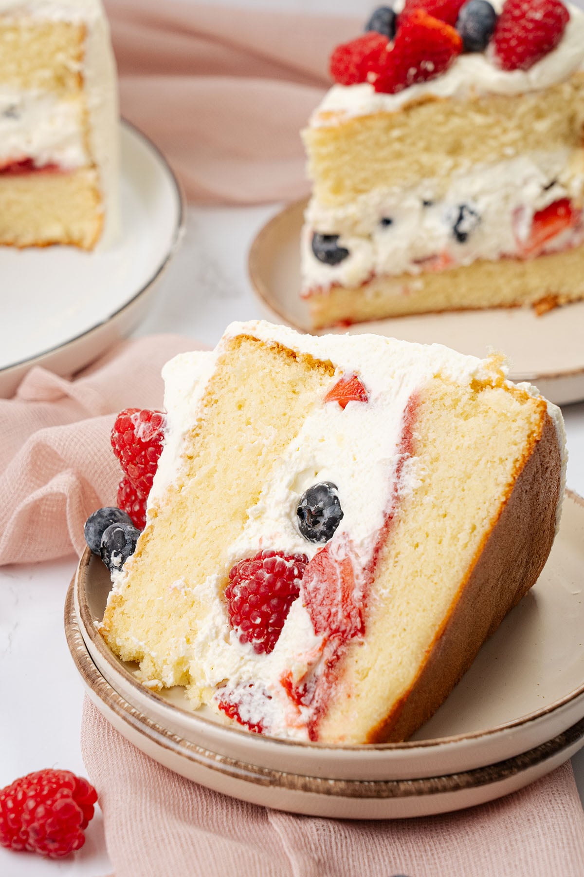 a slice of Berry chantilly cake