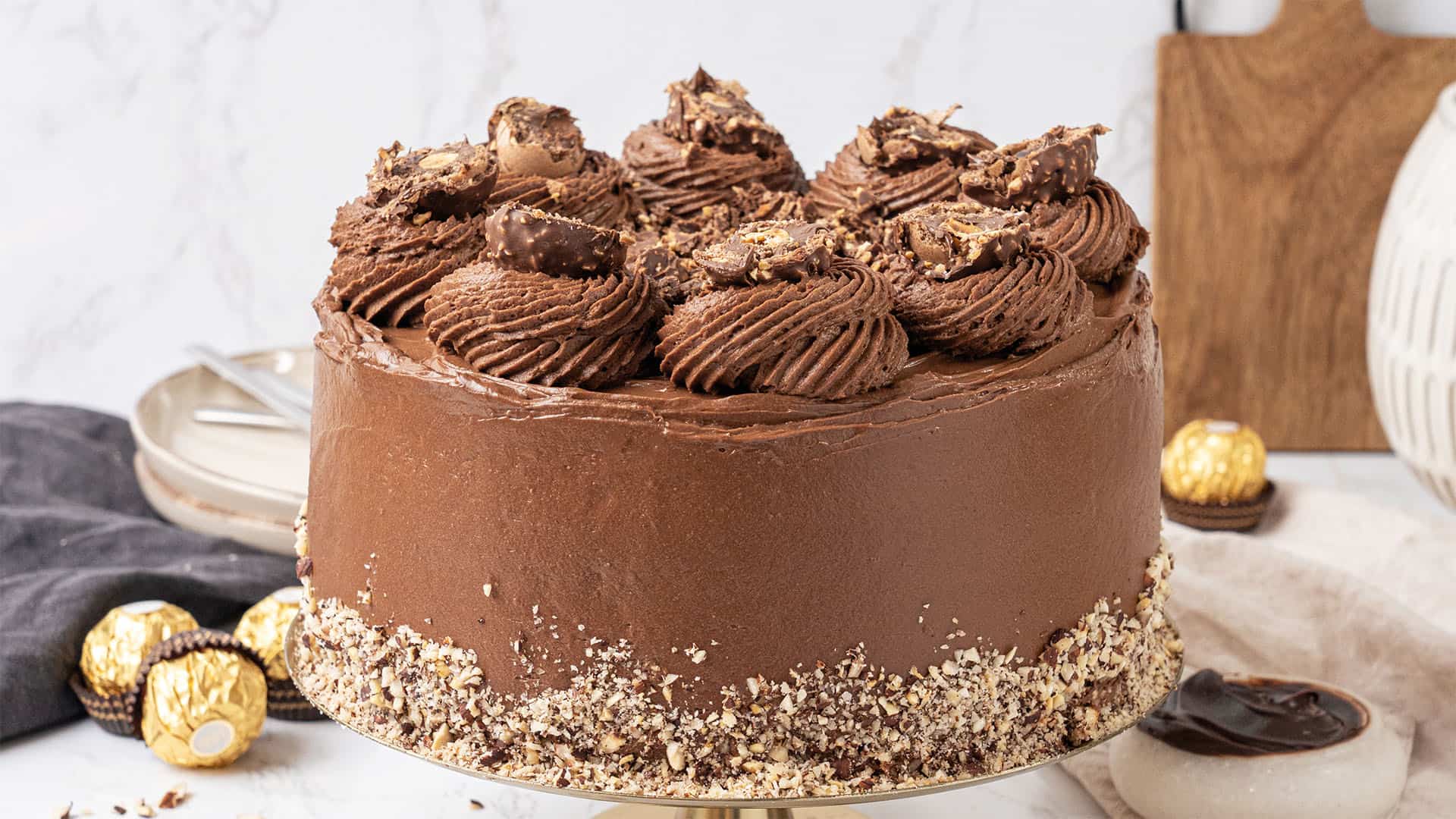 Ferrero Rocher cake on a cake stand
