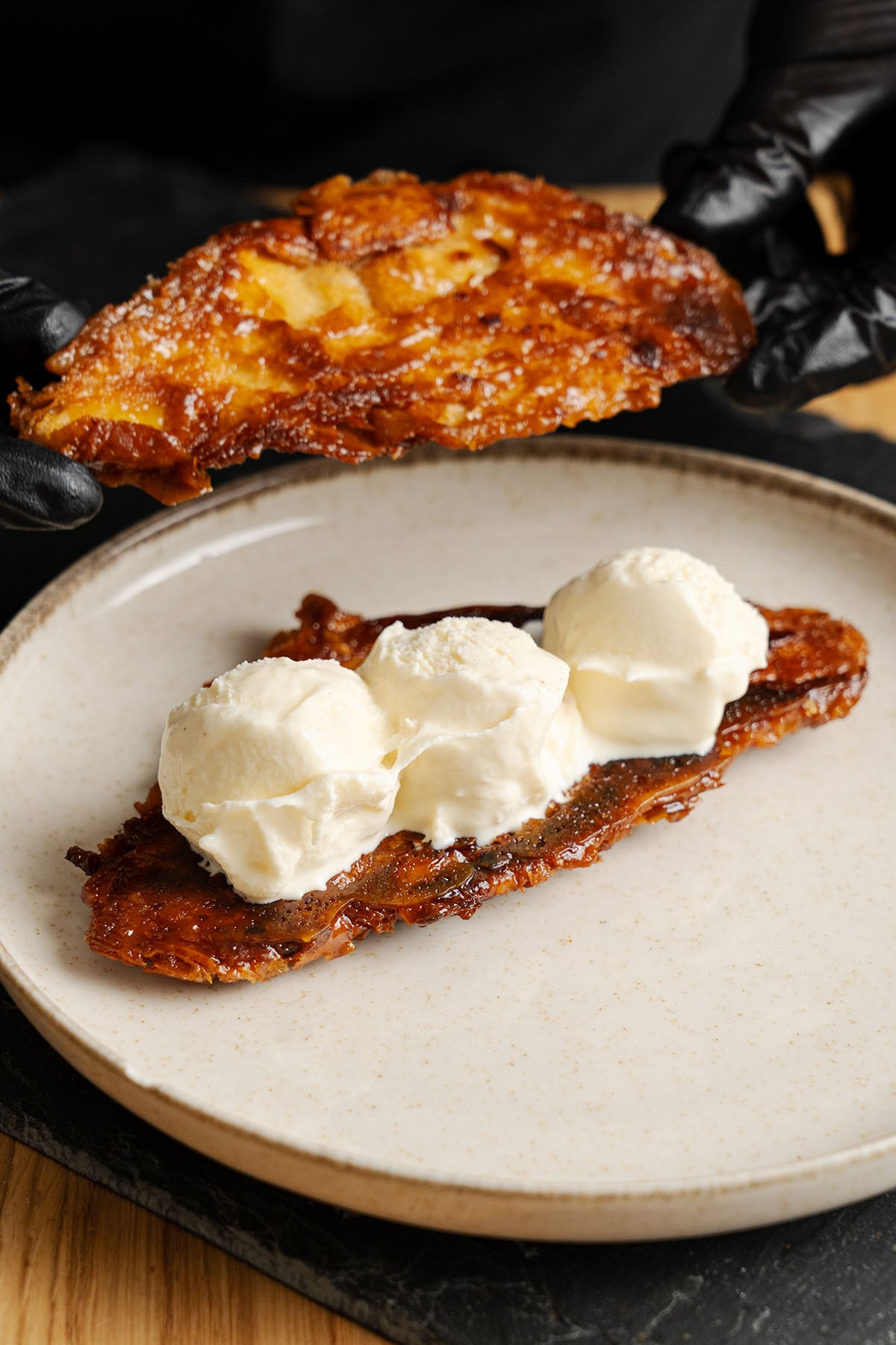 Croissant Ice Cream Sandwich on a plate.