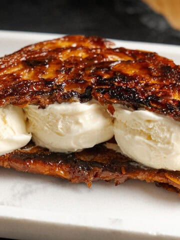 Croissant Ice Cream Sandwich on a plate.