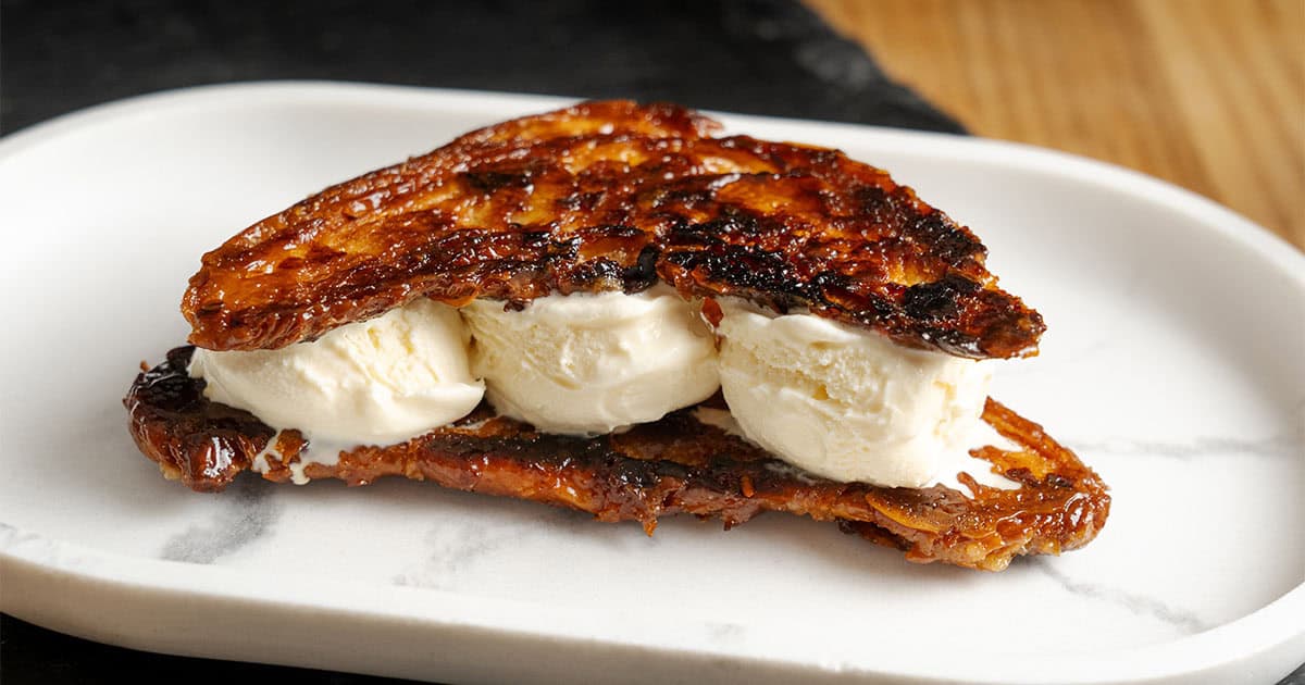 Croissant Ice Cream Sandwich on a plate.
