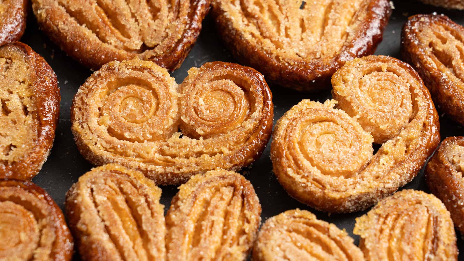 Palmiers on a cutting board.