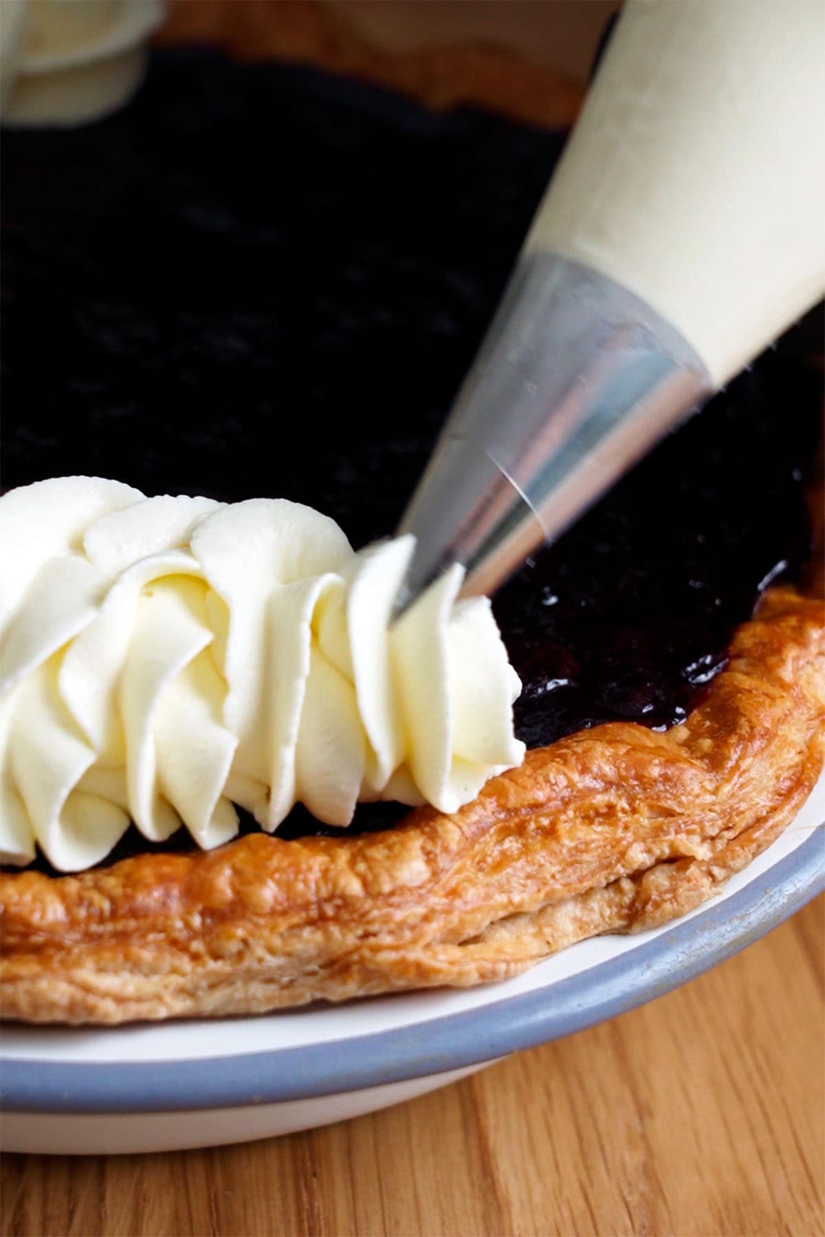 Piping decoration on the Blueberry Cream Pie