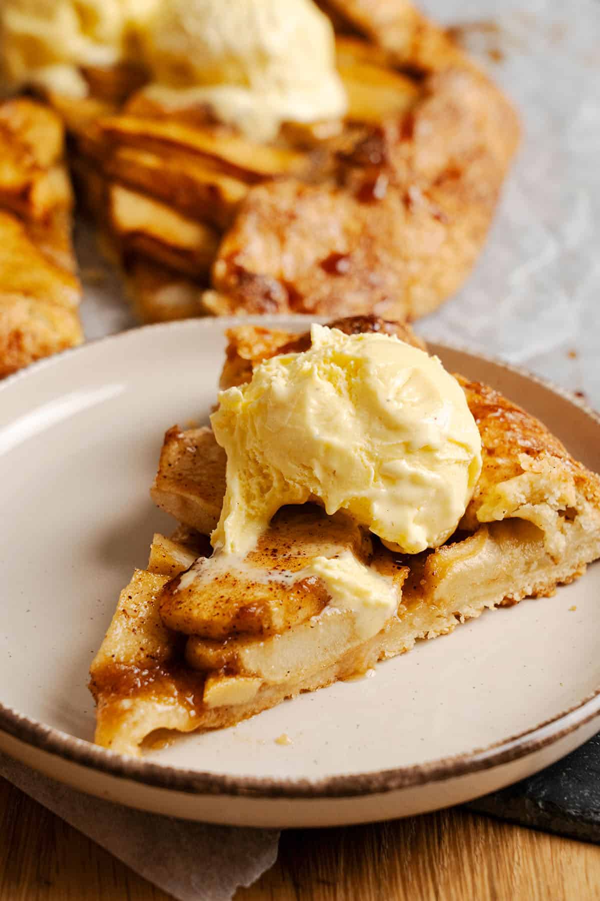 A slice of Apple Galette on a plate.