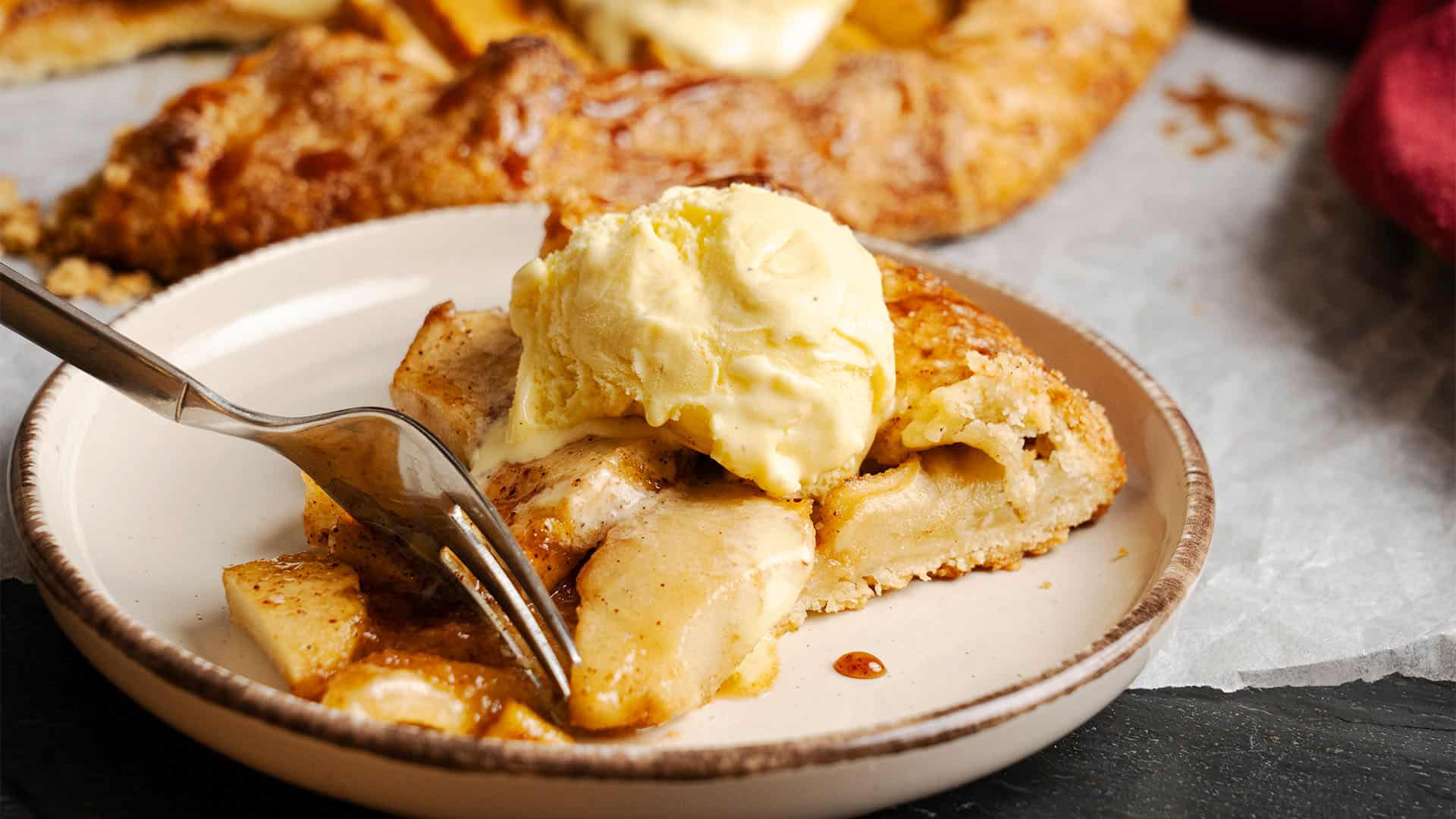 A slice of Apple Galette on a plate.