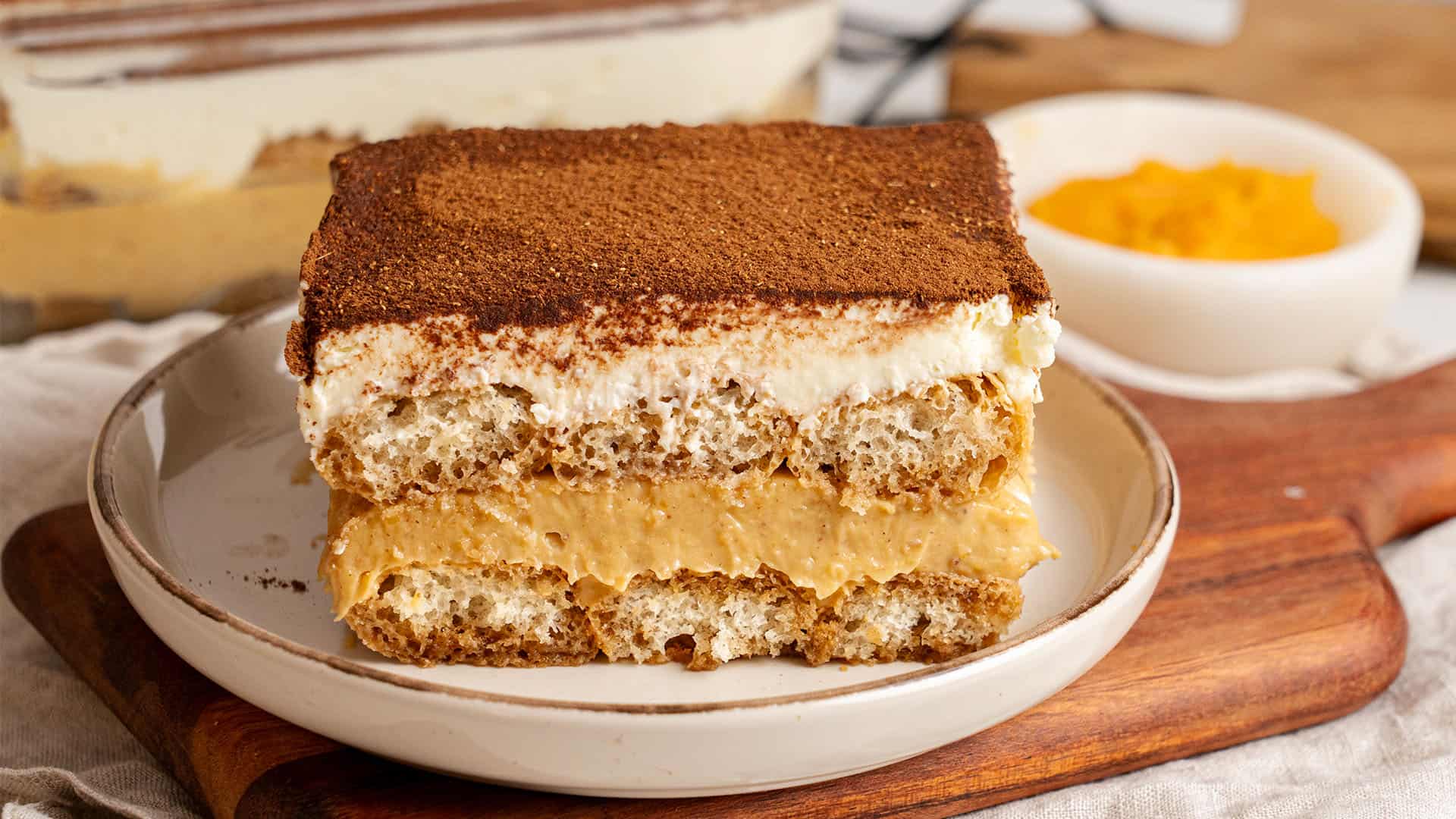 A slice of Pumpkin Tiramisu on a plate.