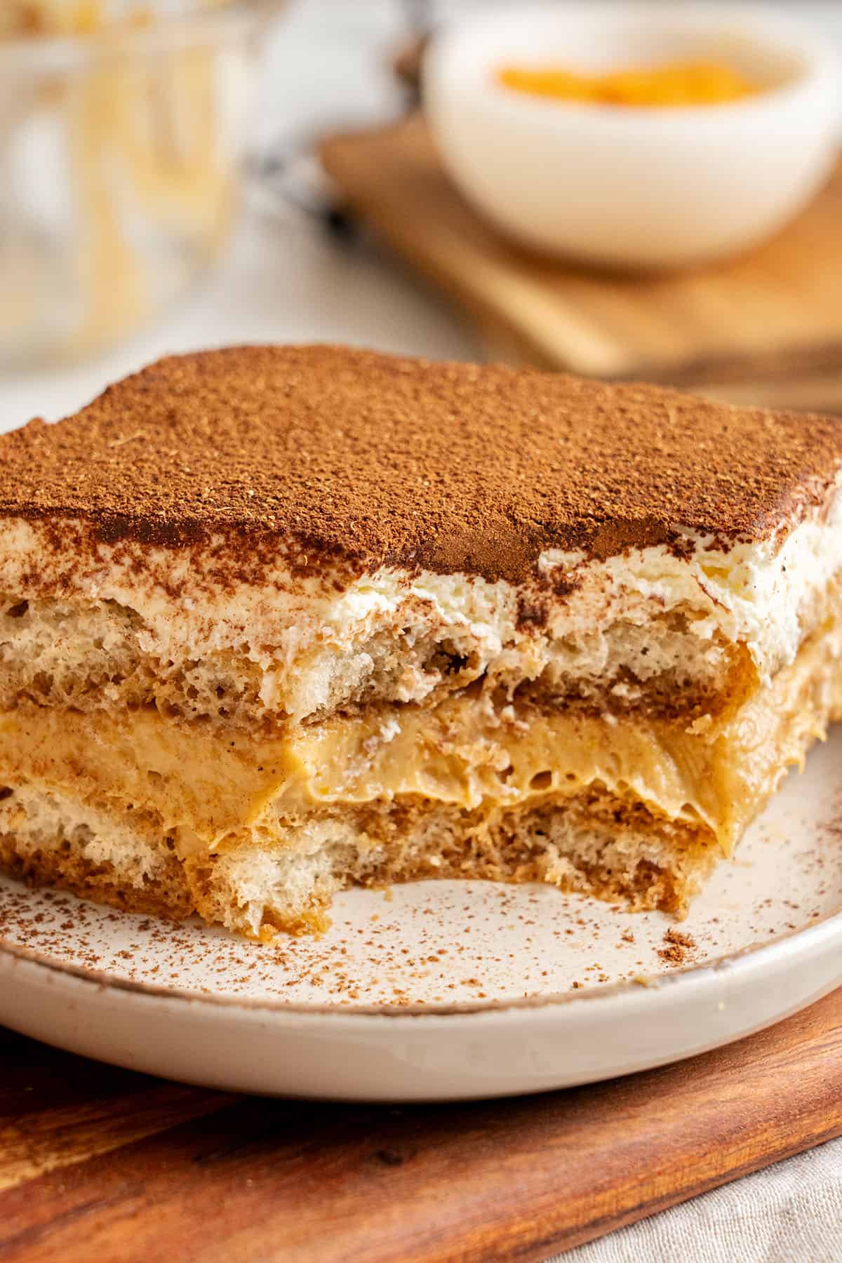 A slice of Pumpkin Tiramisu on a plate.