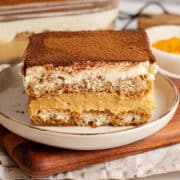 A slice of Pumpkin Tiramisu on a plate.